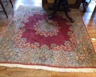 Rose colored Persian rug