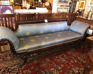Centennial Antique Empire mahogany carved sofa, covered in blue silk upholstery now $500