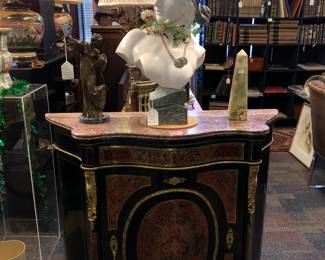 Large marble bust on Boule cabinet