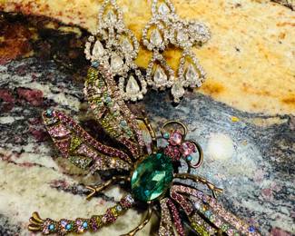 Heidi Dauss trembler dragonfly pin.