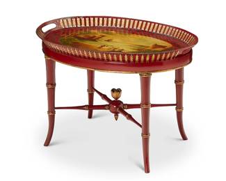 3085
A French tole tray and lacquered wood stand
19th/20th century
The tray with opposed handles and openwork rim, the well painted with a scene of figures along a shoreline with a ship in the distance, set on a later oval base raised on sloping bamboo-form legs joined by an X-stretcher
Overall: 16.75" H x 23.75" W x 17.5" D
Estimate: $200 - $300