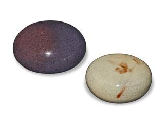 3284
Vivika & Otto Heino (1910-1995 & 1915-2009)
Two glazed studio pottery paperweights, 1992-2002
One with incised signature and date: Vivika & Otto / 92; the other incised: Otto / 02
Comprising one with cream craquelure glaze and another with purple glaze
2 pieces
Cream: 1.1875" H x 3.5" Dia.; Purple: 2.375" H x 4.125" Dia.
Estimate: $400 - $600