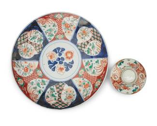 3219
Two Japanese Imari porcelain vessels
20th century
Each unmarked
Comprising a large charger and a lidded rice bowl
2 pieces
Charger: 14.875" Dia.; Rice bowl: 3.375" H x 5.125" Dia.
Estimate: $300 - $400