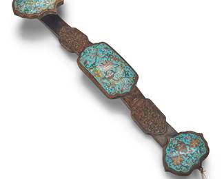 3161
A Chinese cloisonné and carved wood Ruyi scepter
20th century or earlier
The wood scepter with three panels of inset enameled copper accents
22.75" H x 6.125" W x 3.25" D
Estimate: $300 - $500