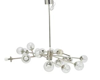 3291
A Modern glass globe chandelier
Early 21st century
The eighteen-light chandelier with polished steel frame issuing six articulated branching arms terminating in clear blown glass globes, electrified
33" H x 59" Dia.
Estimate: $200 - $400