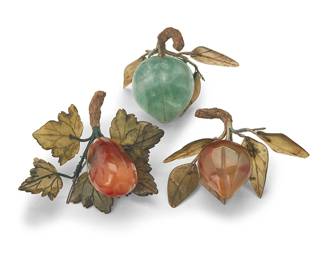 3173
Three Chinese carved hardstone fruits
20th century or later
Comprising a fluorite peach, a carnelian peach, and a carnelian fig, each with pliable thread-wrapped branches and hardstone leaves
3 pieces
Largest overall: 3.25" H x 3.75" W x 2" D
Estimate: $100 - $200