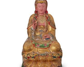 3236
An Asian polychrome carved wood figure of Guanyin
20th century
The painted and gilt figure depicted seated with hands in vitarka mudra
16" H x 8.5" W x 7.25" D
Estimate: $200 - $400
