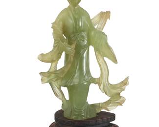 3169
A Chinese carved jade figure of a beauty
20th century
Set on a hardwood stand
Figure: 7.625" H x 4.75" W x 2.125" D; Overall: 9.125" H
Estimate: $200 - $300