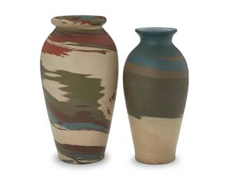 3309
Two Niloak pottery 'Mission Swirl' vases
Early/mid-20th century; Eagle Pottery Company, Benton, AR
Each impressed: Niloak; taller with applied factory sticker
Each tall vase with flared rim
2 pieces
Taller: 10.375" H x 5.625" Dia.; Shorter: 9.5" H x 4.625" Dia.
Estimate: $500 - $700