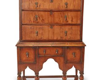 3090
A William & Mary walnut chest on stand
Late 17th/early 18th century, with later elements
The chest with five locking drawers and later brass hardware, set on a stand with three drawers above an architectural apron raised on turned legs joined by a shaped box stretcher
62.75" H x 40.5" W x 22.5" D
Estimate: $600 - $800