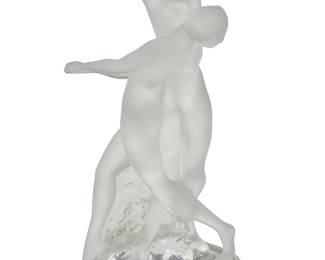3031
A Lalique glass 'Deux Danseuses' figural group
Late 20th century
Designed 1960 by Marc Lalique (1900-1977)
Etched: Lalique ® France [post-1978]; with factory stickers
Depicting two nude dancer figures in frosted and clear glass
10.25" H x 5.75" W x 5.125" D
Estimate: $200 - $300
