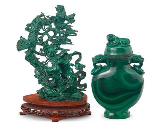 3156
Two Chinese malachite carvings
20th century
Comprising a lidded urn with guardian lion-form finial and opposed handles with ring accents, and a celestial figure group set on a carved wood stand
2 pieces
Urn: 7.875" H x 4.75" W x 1.875" D; Figural group without base: 8.625" H x 6" W x 2.625" D
Estimate: $500 - $700