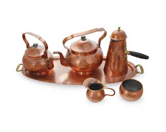 3051
A hammered copper coffee, tea, and hot chocolate service
Early/mid-20th century
Each unmarked
Comprising a teapot (7.75" H x 10.25" W x 7.25" D), a coffee pot (7.375" H x 7.875" W x 6" D), a chocolate pot (8.5" H x 7.875" W x 4.625" D), an open sugar (2.375" H x 3.875" Dia.), and a creamer (3" H x 5.25" W x 3.125" D), all set on an oval tray with opposed handles (24.25" W x 9.625" D)
6 pieces
Estimate: $300 - $500