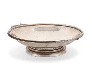 3004
An International sterling silver footed bowl
Mid-20th century
Designed by Alphonse La Paglia (1907-1953)
Marked to underside: International Sterling / La Paglia Designed / 243
The bowl with foliate-form trim to rim
3.25" H x 10.5" W x 7.5" D
32.8 oz. troy approximately
Estimate: $700 - $900