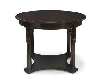 3303
A Greystone wood side table
Late 20th century; Italy
With metal tag applied to underside: Greystone Home Collection; burn marked: Made in Italy
The round wood side table raised on four fluted legs joined by an undershelf
29" H x 38.5" Dia.
Estimate: $200 - $400