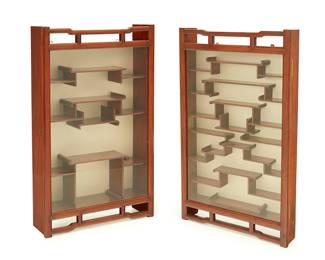 3207
Two chinoiserie hardwood wall-mounted display cabinets
Mid-20th century
Each with locking glazed door revealing a fitted shelf interior with fabric backing
2 pieces
Larger: 33.5" H x 20" W x 6" D; Smaller: 33" H x 19.5" W x 3.75" D
Estimate: $500 - $700