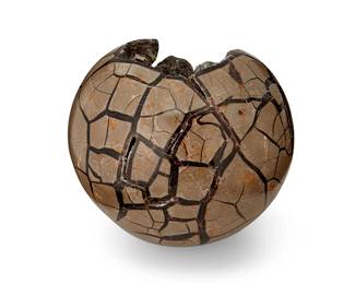 3262
A septarian spherical mineral specimen
20th century
Exterior polished
8.25" Dia.
Estimate: $200 - $300