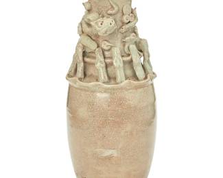 3186
A Chinese celadon glazed pottery hunping funerary urn
Song/Yuan Dynasty (960-1368) or later
Applied with a border of twelve standing figures and a striding dragon in relief around the neck
12.5" H x 4.625" Dia.
Estimate: $400 - $600
