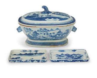 3115
A Chinese blue and white porcelain tureen and pair of dishes
Late Qing Dynasty (1644-1912) or later
Comprising a lidded tureen with figural grotesque handles and gourd stem lid finial, and two rectangular dishes, each decorated with seaside village scenes
3 pieces
Tureen: 7.75" H x 13" W x 9.5" D; Each dish: 0.625" H x 6.875" W x 4.375" D
Estimate: $400 - $600