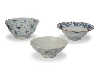 3116
Three Chinese Export blue and white porcelain footed bowls
19th/20th century
Two bearing blue underglaze indistinct inscriptions
3 pieces
Tallest: 3.25" H x 6.75" Dia.; Shortest: 2.25" H x 5.875" Dia.
Estimate: $300 - $500