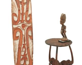 3270
A group of Sierra Leone and New Guinea carvings
20th century
Comprising a polychrome pigmented shield, a small figure, and a tripod table raised on elephant-form supports
3 pieces
Shield: 52" H x 12.5" W; Figure: 16.75" H; Table: 20" H x 16.5" W x 16" D
Estimate: $300 - $500