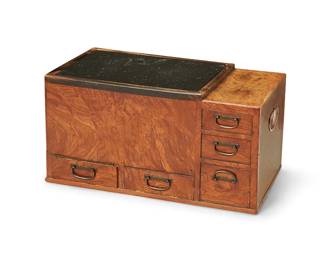 3223
A Japanese wood hibachi with black marble top
Edo Period (1603-1867) or later
With five drawers, brass hardware, inset opposed handles, and later added black marble top
15.5" H x 30" W x 17" D
Estimate: $300 - $500