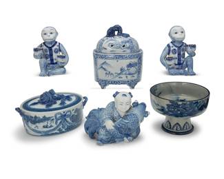 3124
A group of Asian-style blue and white porcelain tableware items
20th century
Footed jar with blue underglaze mark; one stamped: Mottahedeh / HC 146
Comprising a pair of Chinese Export monkey-form two-light candleholders, a boy and carp figural group, a footed and lidded oval jar with dragon-form finial, a footed bowl, and a Mottahedeh 'Blue Canton' lidded casserole
6 pieces
Each monkey: 7.125" H x 5.5" W x 4.375" D; Footed jar: 9.625" H x 7.625" W x 5.875" D
Estimate: $200 - $400