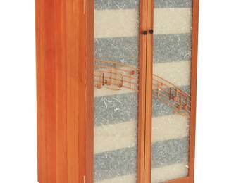 3299
Harold Greene (b. 1953)
A Contemporary music cabinet, 2017
The Douglas fir cabinet with walnut top and glass doors constructed of two panes sandwiching mulberry paper, each front featuring mounted carved carob wood notes representing the blues song "CC Ryder," made famous by Big Bill Broonzy, opening to reveal eight Finnish birch plywood sliding drawers, each fitted with adjustable slanted dividers for storing 12" vinyl records
58.75" H x 35.5" W x 27" D
Estimate: $400 - $600