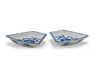 3119
A pair of Chinese blue and white porcelain sweet meat dishes
Qing Dynasty (1644-1912) or later
The trapezoidal dishes each decorated with beasts and scrolled motifs
2 pieces
Each: 1" H x 5.375" W x 4.5" D
Estimate: $300 - $400