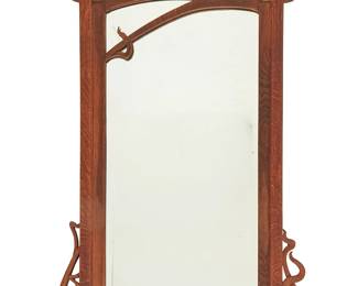 3074
An Art Nouveau carved wood mirror
Early 20th century
The wood frame with beveled glass mirror
61.5" H x 39.75" W x 2.75" D
Estimate: $400 - $600