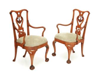 3109
A pair of George II-style upholstered chairs
19th century with later elements
Each back with carved openwork splat depicting a fabric swag and heart, raised on ball in claw feet, later upholstered in a textured fabric
2 pieces
Each: 39.75" H x 24.25" W x 25" D
Estimate: $100 - $200