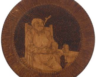 3308
A Folk Art carved wood pictorial plaque
20th century
Incised with initials at lower right: M.W.
The carved, burnt, and stained wood panel laminated to another wood panel, depicting a man with an apron, sitting in a chair smoking and drinking an ale
24" Dia.
Estimate: $200 - $300