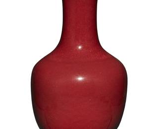 3134
A Chinese oxblood porcelain vase
20th century
Unmarked
The footed vase with tall neck and flared rim
13" H x 7.375" Dia.
Estimate: $800 - $1,000