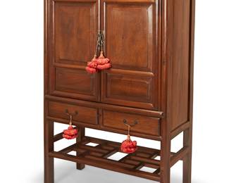 3197
A chinoiserie wood cabinet
Mid/late 20th century
The cabinet with brass hardware, featuring hinged cabinet doors revealing two shelves, above two drawers and an openwork undershelf
65.75" H x 39.75" W x 19.5" D
Estimate: $400 - $600