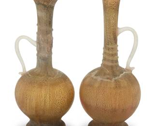 3325
Two Murano scavo glass pitchers
20th century
Each unmarked
2 pieces
Taller: 6.75" H x 2.75" Dia.; Shorter: 6.5" H x 2.875" Dia.
Estimate: $200 - $400