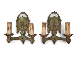 3079
A pair of Art Nouveau-style sconces
Mid-20th century
The enameled and gilt-metal sconces, each issuing two lights with faux candle fixtures, electrified
2 pieces
Each: 11" H x 10.25" W x 4.125" D
Estimate: $50 - $100