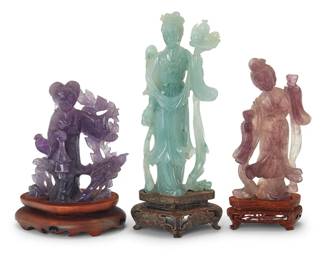 3168
A group of Chinese carved hardstone maidens
20th century
Comprising two fluorite and one jade, each set on a carved wood stand
3 pieces
Jade: 7.5" H x 3.25" W x 1.875" D; Shorter fluorite: 5.125" H x 4.25" W x 2" D
Estimate: $200 - $400