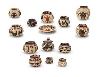 3267
A group of Panamanian Wounaan basketry vessels
Late 20th/early 21st century; Darién Province, Panama
The polychrome coiled baskets woven from palm frond fibers, each depicting rainforest floral and fauna including a sea turtle, grasshoppers, scorpions, and butterflies
4 pieces
Largest: 5.75" H x 5.75" Dia.; Shortest: 3.5" H x 5.125" Dia.
Estimate: $300 - $500