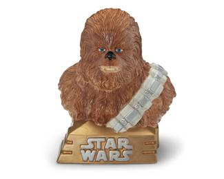 3316
A Star Wars ceramic Chewbacca cookie jar
Late 20th century
Edition: 865/1000
Numbered and inscribed to underside: Star Limited Editions Jars / 028 / Treasure Craft / A Pfaltzgraff Company / Chewbacca / © (1997) Lucasfilm Ltd.
The enameled ceramic figural lidded jar depicting Star Wars character Chewbacca
15.75" H x 13.5" W x 11.25" D
Estimate: $200 - $300
