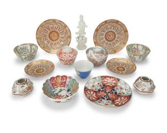 3220
A group of Japanese and Chinese ceramic plates and bowls
20th century
Some variously marked in red or blue underglaze
Comprising two Famille Rose rice bowls, two Kutani brush pots five plates, an Arita ware plate, an Imari scallop-edged bowl, a Dehua-style figure of Guanyin, and other assorted bowls and plates
14 pieces
Guanyin: 7.75" H; Largest plate: 7.625" Dia.; Famille Rose bowls: 2.375" H x 4.875" Dia.
Estimate: $300 - $500