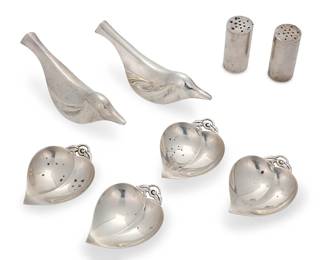 3019
A group of sterling silver table items
Mid-20th century
Each marked for sterling; rests and shakers marked: Allan Adler; bowls marked Tiffany & Co. / 22886 / L [directorship of William T. Lusk (1956-1965)]
Comprising a pair of Allan Adler (1916-2002) bird-form knife rests and salt and pepper shakers, and four Tiffany & Co. small cordiform dishes
8 pieces
Each bird: 5.5" L; Shakers: 2.25" H x 1.125" Dia.; Each bowl: 0.625" H x 3.25" W x 2.5" D
Total weight: 9.5 oz. troy approximately
Estimate: $200 - $300