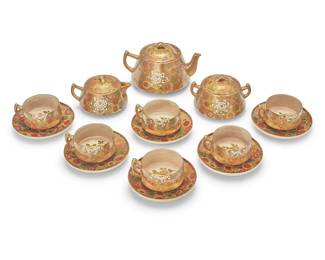 3226
A Japanese Satsuma porcelain tea service
Showa Era (1926-1989)
Each with gilt on black marks and Shimazu crest
Possibly Koshida, each piece painted and gilt with millefleur design, comprising a teapot, a lidded sugar, a lidded creamer, and six teacups with saucers
15 pieces
Teapot: 4.5" H x 7.25" W x 5.5" D; Each saucer: 5.375" Dia.
Estimate: $300 - $500