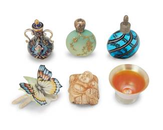 3330
A group of decorative items
Late 19th/20th century
Meissen with blue underglaze crossed swords; butterfly marked: [lion] / JHR / Germany; perfume cap marked for sterling, London, 1885, and maker: SM [Sampson Mordan]
Comprising a Steuben Aurene glass open salt (1.75" H x 2.375" Dia.), a Meissen enameled porcelain miniature covered vase with opposed handles (3.25" H), a Hutschenreuther porcelain butterfly (1.875" H x 2.75" W x 2.5" D), an art glass perfume bottle with sterling silver cap (2.875" H), a gilt-painted glass perfume bottle with metal cap (3.625" H), and a Chinese figural bone carving (2.625" H x 1.875" W x 1.125" D)
6 pieces
Estimate: $300 - $500