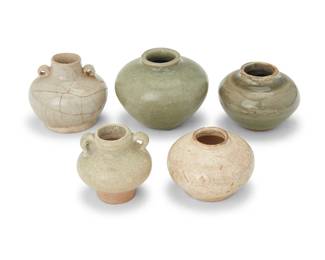 3243
A group of East Asian glazed ceramic jarlets
15th century or later
Two with opposed lug handles
5 pieces
Largest: 2.25" H x 2.75" Dia.; Shortest: 1.625" H x 2.25" Dia.
Estimate: $300 - $500