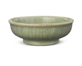 3131
A Chinese celadon porcelain bowl
Qing Dynasty (1644-1912) or later
The footed bowl with pale green glaze
2.25" H x 6" Dia.
Estimate: $400 - $600