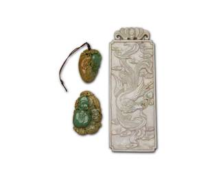 3176
Three Chinese carved hardstone decorations
20th century
Comprising a rectangular plaque carved with a phoenix on one side, and the two green pebble pendants, one carved with peaches and a dragon, the other with a gourd and a Happy Buddha
3 pieces
Largest: 8.25" H x 3.125" W; Pendants: 2.25" L and 2.75" L
Estimate: $400 - $600