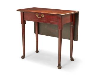 3097
A George II mahogany drop-leaf table
Mid-18th century
The single drawer table with gilt metal pull and gate leg support for drop leaf extension, raised on pad feet
Stored: 28" H x 29.25" W x 16.5" D; Open: 31.25" D
Estimate: $300 - $500
