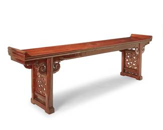 3200
A Chinese hardwood altar table
18th/19th century
The tabletop with molding at each end, raised on pedestal supports, featuring openwork cloud motif corbels and support elements
38.5" H x 121.25" W x 20.25" D
Estimate: $400 - $600