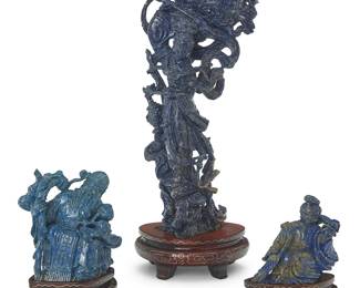 3157
Three Chinese lapis lazuli figural carvings
20th century
Comprising a large figural sculpture and two smaller figures, each set in an inlaid carved wood stand
3 pieces
Largest: 10.5" H x 4.5" W x 2.75" D; Smallest: 3" H x 3" W x 1.5" D
Estimate: $400 - $600