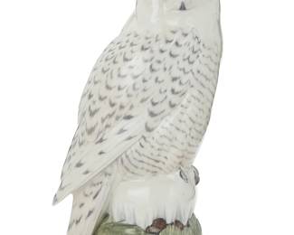 3037
A Royal Copenhagen porcelain snow owl
1974-1978
Designed by Peter Herold (1879-1920)
Marked and numbered: Royal / [crown] / Copenhagen / Denmark / 1829; incised signature at base: PHerold
The owl depicted perched on a pine bough
15.75" H x 8.5" W x 6.75" D
Estimate: $300 - $500